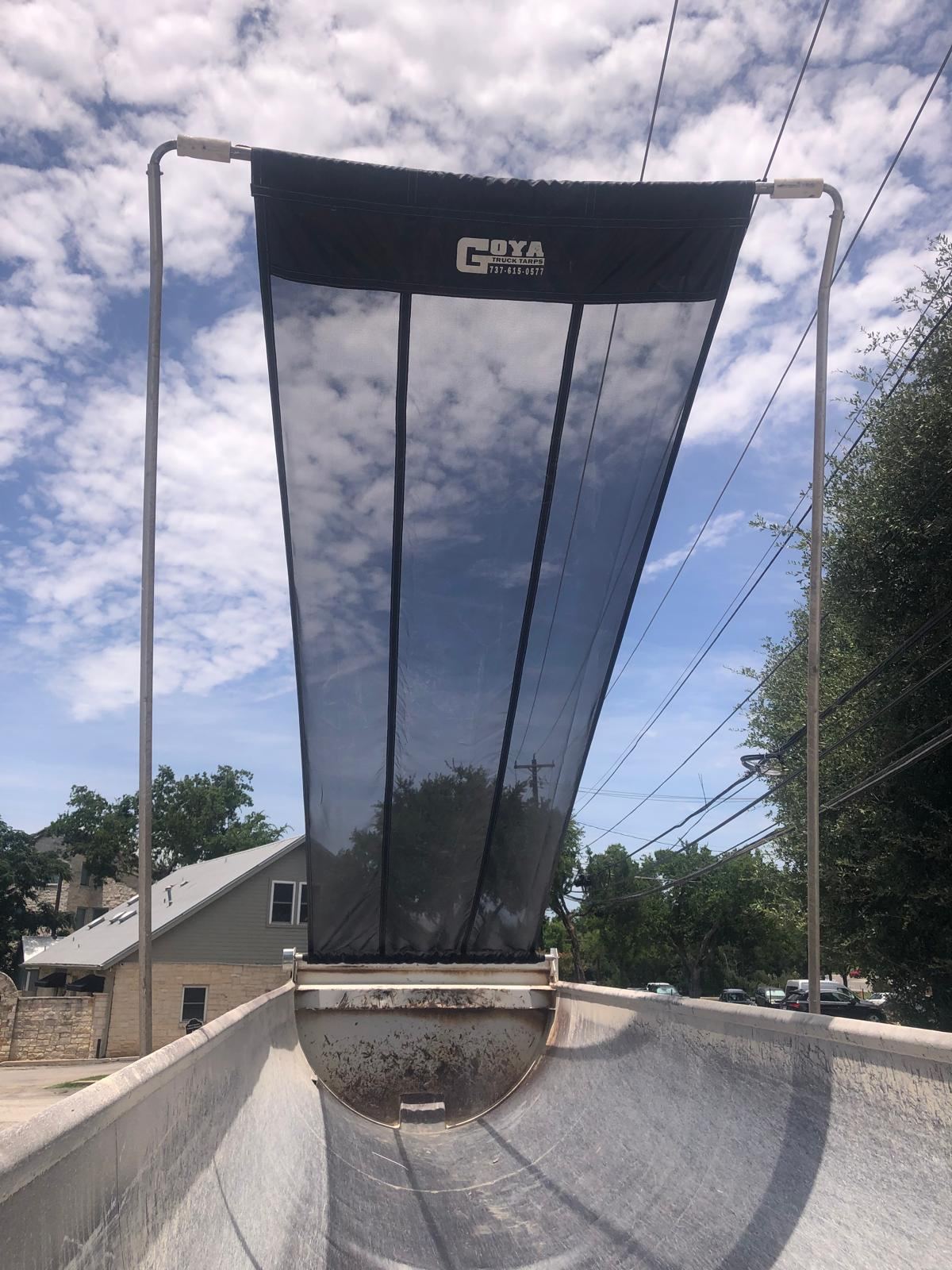 Arm System tarp in Lumite mesh installed on a dump truck